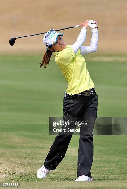 Mika Takushima hits a second shot at 9th hole during the round one of the Yokohama Tire Golf Tournament PRGR Ladies Cup at Tosa Country Club on March...