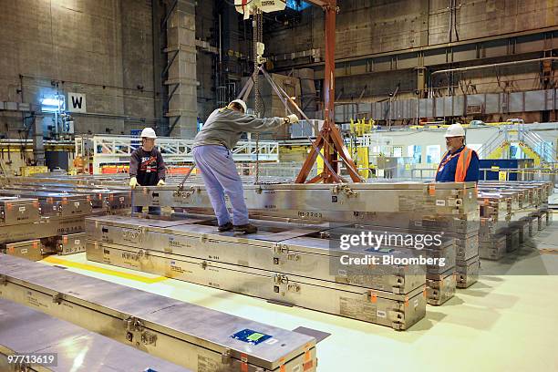 Containers for new nuclear fuel rod assemblies from Global Nuclear Fuel, a joint venture of General Electric Co., Toshiba Corp., and Hitachi Ltd.,...