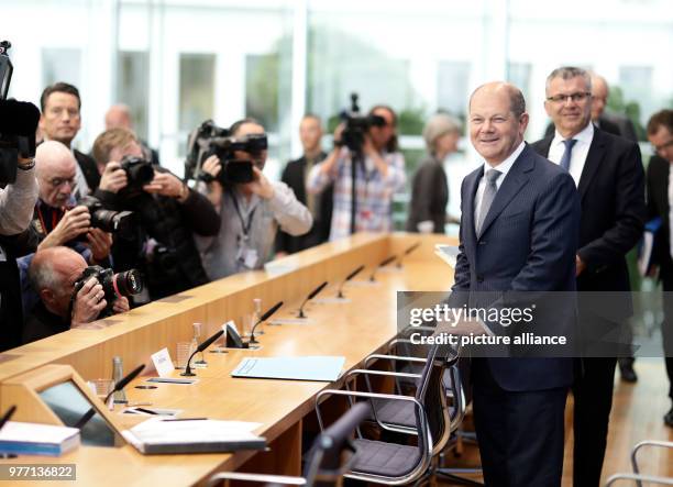 May 2018, Germany, Berlin: Minister of Finance, Olaf Scholz of the Social Democratic Party , and Secretary of the Ministry of Finance, Werner Gatzer...