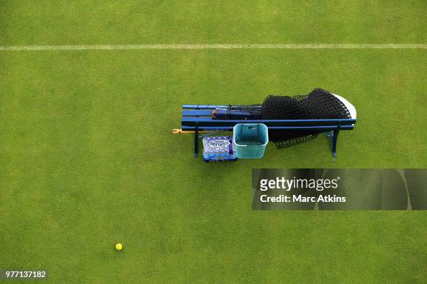Net and tennis ball lay on a court before qualifying Day 2 of the Fever-Tree Championships at Queens Club on June 17, 2018 in London, United Kingdom.