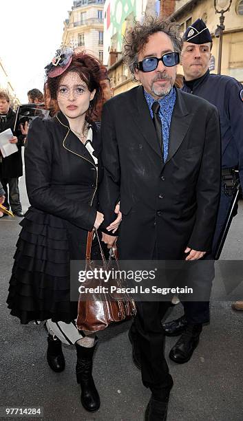 Director Tim Burton and partner Helena Bonham Carter arrive at the Ministere de la Culture on March 15, 2010 in Paris, France.