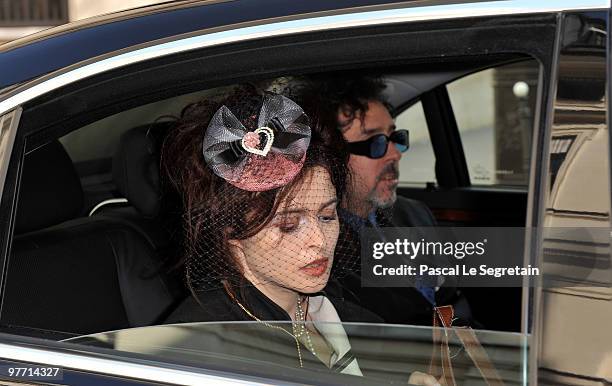Director Tim Burton and partner Helena Bonham Carter arrive at the Ministere de la Culture on March 15, 2010 in Paris, France.