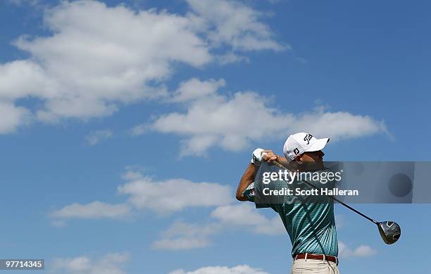 Bill Haas tees off on the eighth tee box during the final round of the 2010 WGC-CA Championship at the TPC Blue Monster at Doral on March 14, 2010 in...