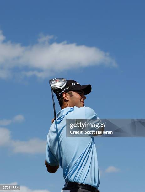 Martin Kaymer of Germany tees off on the eighth tee box during the final round of the 2010 WGC-CA Championship at the TPC Blue Monster at Doral on...