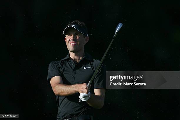 Charl Schwartzel of South Africa tees off on the 15th tee box during the final round of the 2010 WGC-CA Championship at the TPC Blue Monster at Doral...