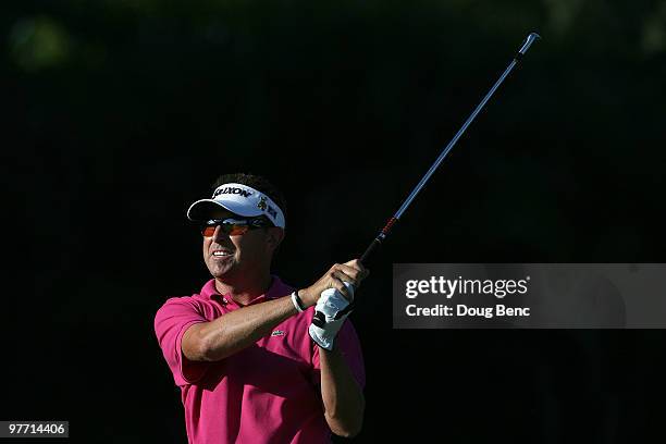 Robert Allenby of Australia tees off on the 15th tee box during the final round of the 2010 WGC-CA Championship at the TPC Blue Monster at Doral on...