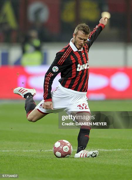 Milan's English midfielder David Beckham kicks the ball during the Italian Serie A football match ACMilan against Chievo on March 14, 2010 at San...