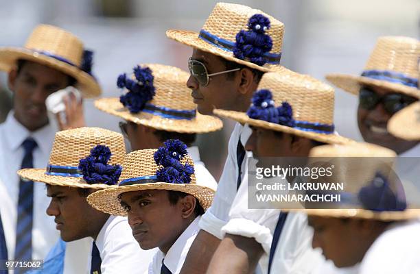 Sri Lankan school students of St Thomas' College watch play at the 131st annual cricket match against Royal College in Colombo on March 13, 2010. The...