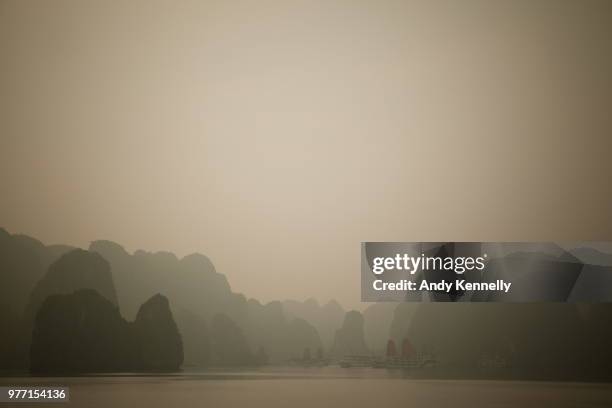 halong bay in fog, quang ninh, vietnam - quang ninh stock pictures, royalty-free photos & images