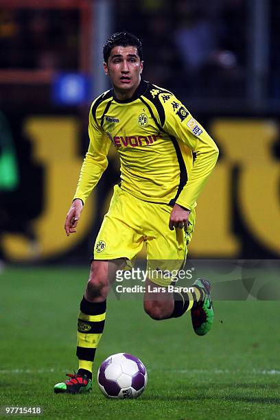 Nuri Sahin of Dortmund runs with the ball during the Bundesliga match between VfL Bochum and Borussia Dortmund at Rewirpower Stadium on March 13,...