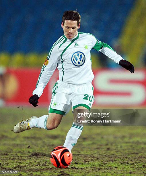 Sascha Riether of Wolfsburg runs with the ball during the UEFA Europa League round of 16 first leg match between Rubin Kazan and VfL Wolfsburg at...