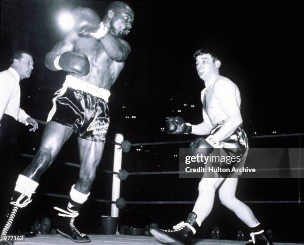 Rubin Carter in action against Harry Scott during their fight at the Royal Albert Hall in London.