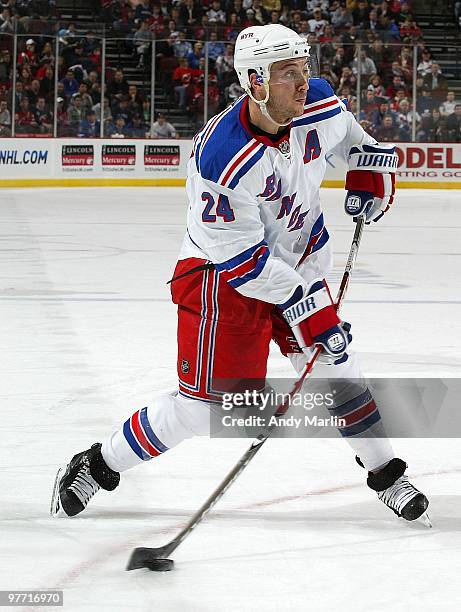 Ryan Callahan of the New York Rangers fires a shot against the New Jersey Devils during the game at the Prudential Center on March 10, 2010 in...