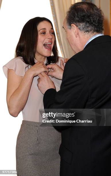 French Actress Marion Cotillard is awarded the Order of Arts and Letters by French Minister of Culture Frederic Mitterrand at Minister Of Culture on...