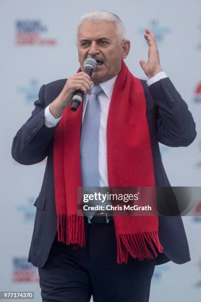 Turkey's Prime Minister Binali Yildirim address the crowd ahead of the arrival of Turkey's President Recep Tayyip Erdogan during a AK Parti election...