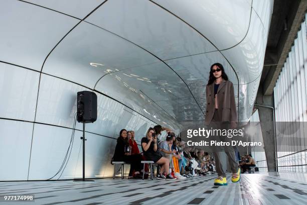 Model walks the runway at the Sunnei show during Milan Men's Fashion Week Spring/Summer 2019 on June 17, 2018 in Milan, Italy.