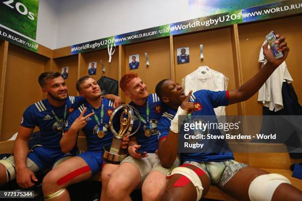 The France players celebrate and take a selfie with the Trophy in their dressing room after the World Rugby via Getty Images Under 20 Championship...