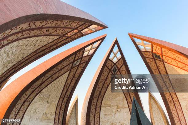 monument against sky, islamabad, pakistan - islamabad stock pictures, royalty-free photos & images