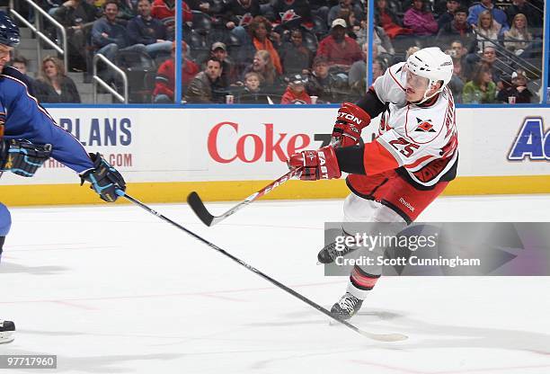 Joni Pitkanen of the Carolina Hurricanes fires a shot to score against the Atlanta Thrashers at Philips Arena on March 7, 2010 in Atlanta, Georgia.