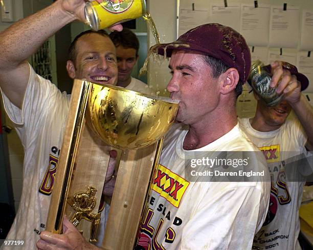 Jimmy Maher and Wade Seccombe of Queensland celebrates winning the Pura Cup cricket final played between Queensland and Victoria at the Gabba in...