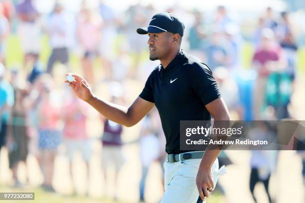 Tony Finau of the United States reacts after making a birdie putt on the ninth green during the final round of the 2018 U.S. Open at Shinnecock Hills...