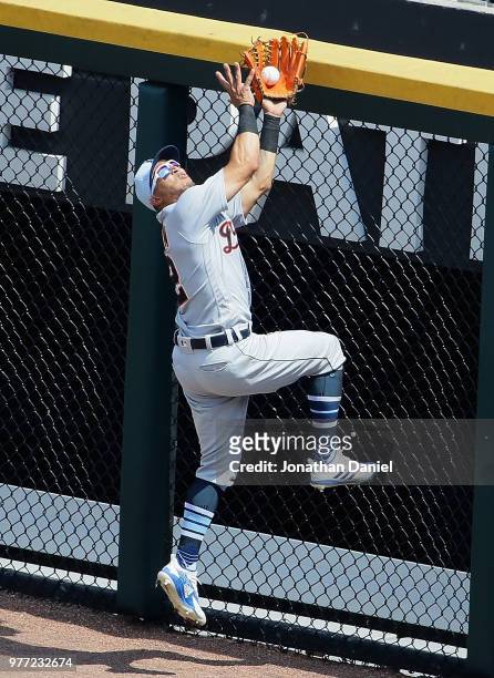 Leonys Martin of the Detroit Tigers makes a catch at the wall on a fly ball hit by Tim Anderson of the Chicago White Sox in the 5th inning at...