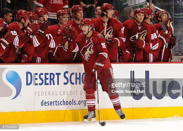 Shane Doan of the Phoenix Coyotes celebrates a goal against the Vancouver Canucks with teammates on March 10, 2010 at Jobing.com Arena in Glendale,...