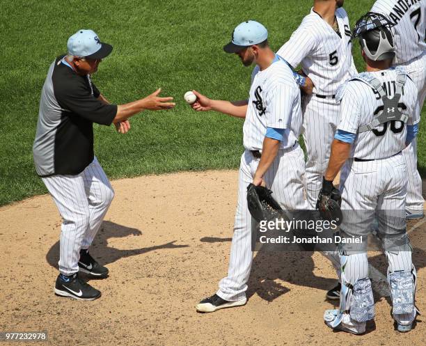 Manager Rick Renteria of the Chicago White Sox takes starting pitcher James Shields out of the game in the 7th inning against the Detroit Tigers at...