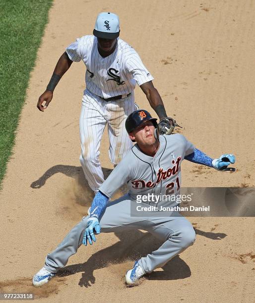 JaCoby Jones of the Detroit Tigers is picked off on a steal attempt in the 7th inning by Tim Anderson of the Chicago White Sox at Guaranteed Rate...
