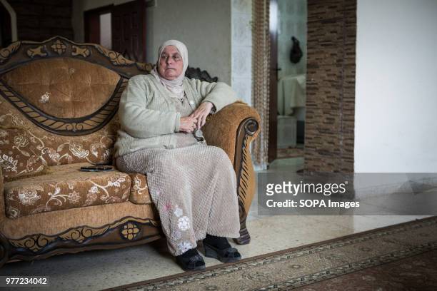 Aunt of Ahed Tamimi sitting on a sofa. Ahed Tamimi has been in prison since December 2017, she is a teenage activist in Palestine and her mother was...