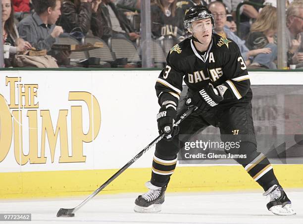 Stephane Robidas of the Dallas Stars handles the puck against the Los Angeles Kings on March 12, 2010 at the American Airlines Center in Dallas,...