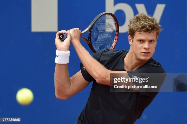 German tennis player Yannick Hanfmann returns to his compatriot Alexander Zverev during 2018 Bavarian International Tennis Championships 'BMW Open'...