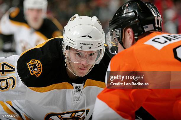 David Krejci of the Boston Bruins readies to face-off against Jeff Carter of the Philadelphia Flyers on March 11, 2010 at the Wachovia Center in...