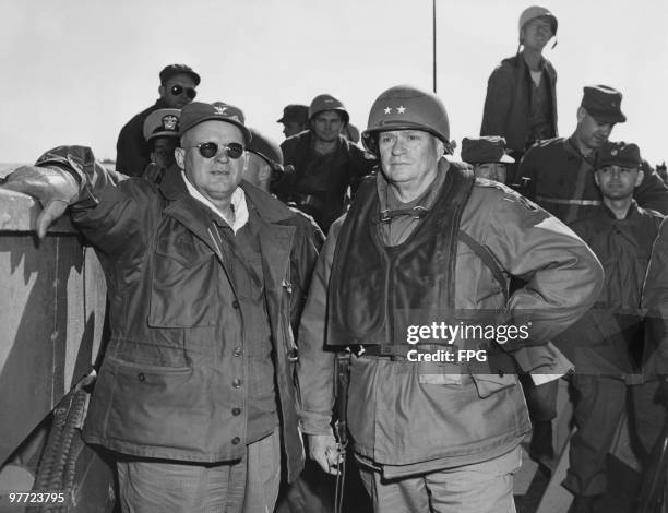 Major General D. G. Barr, Commanding General of the 7th Division, with Colonel Twitty on the beach at Iwon during the Korean War, 16th November 1950....