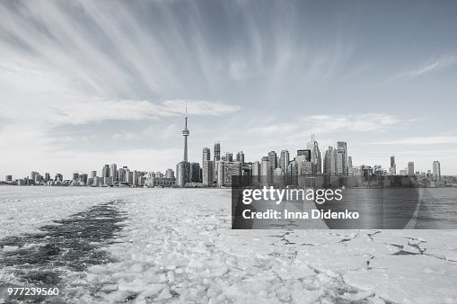 Frozen lake and cityscape, Toronto, Ontario, Canada Frozen lake and cityscape, Toronto, Ontario, Canada