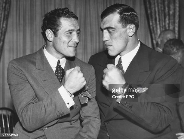 American boxer and actor Max Baer and Italian boxer Primo Carnera meet outside the ring in New York City, 3rd May 1934. They met in the ring on 14th...