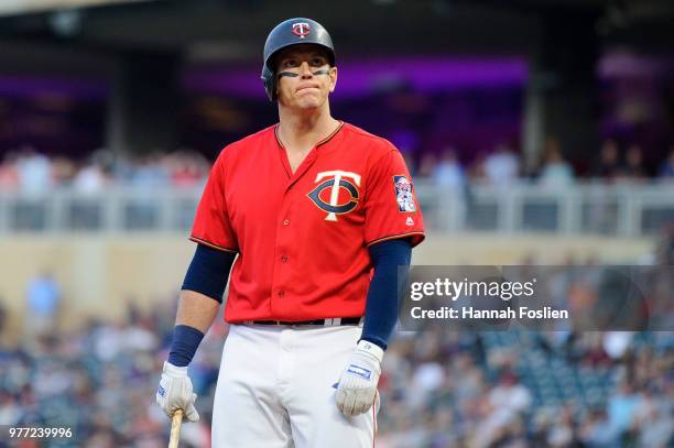 Logan Morrison of the Minnesota Twins reacts to striking out against the Los Angeles Angels of Anaheim during the game on June 8, 2018 at Target...