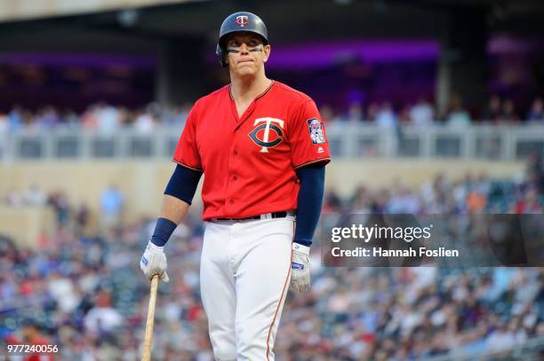 Logan Morrison of the Minnesota Twins reacts to striking out against the Los Angeles Angels of Anaheim during the game on June 8, 2018 at Target...