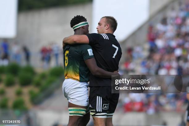 Phendulani Buthelezi of South Africa and Tom Christie of New Zealand have a conversation after the final whistle of the World Rugby Under 20...