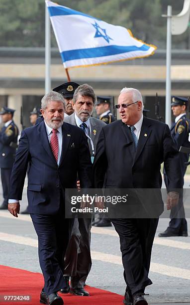 Brazilian President Luiz Inacio Lula da Silva is welcomed during a reception ceremony by Knesset speaker Reuven Rivlin upon his arrival at the...