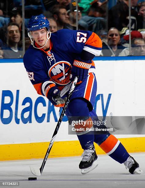 Blake Comeau of the New York Islanders moves up ice against the New Jersey Devils in an NHL game at the Nassau Coliseum on March 13, 2010 in...