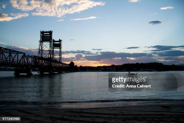 batemans bay bridge at sunset - batemans bay stock-fotos und bilder