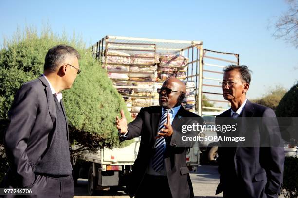 Chinese business man and senior government civil servants attending the event. The donation event by the Charity Association of Chinese in Botswana...