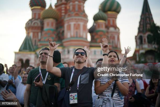 World Cup football fans watch the Germany v Mexico game on a TV, near Red Square on June 17, 2018 in Moscow, Russia. Today saw the first shock result...