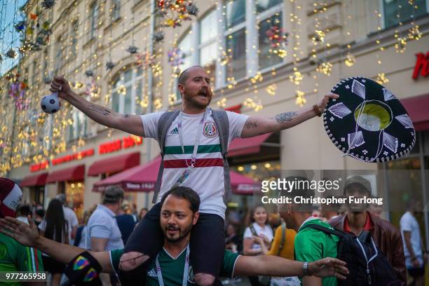Mexican football fan enjoys the World Cup party atmosphere on Nikolskaya Street, near Red Square on June 17, 2018 in Moscow, Russia. Today saw the...