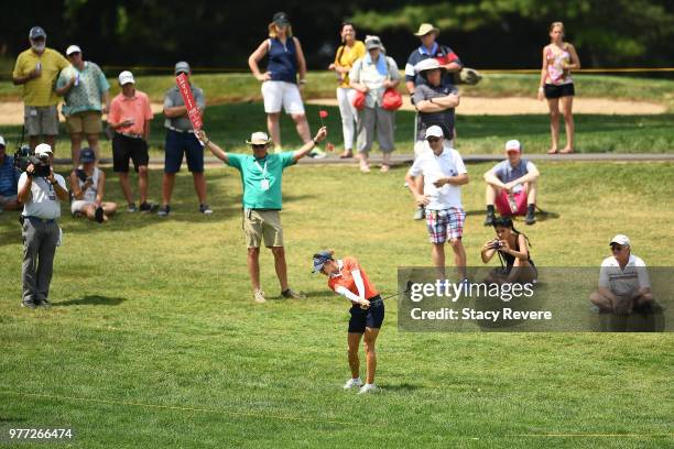 Azahara Munoz of Spain hits her second shot on the 15th hole during the final round of the Meijer LPGA Classic for Simply Give at Blythefield Country...