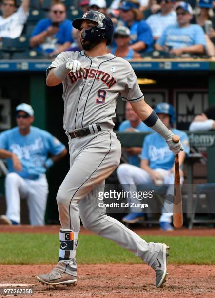 Marwin Gonzalez of the Houston Astros hits an RBI single in the eighth inning against the Kansas City Royals at Kauffman Stadium on June 17, 2018 in...