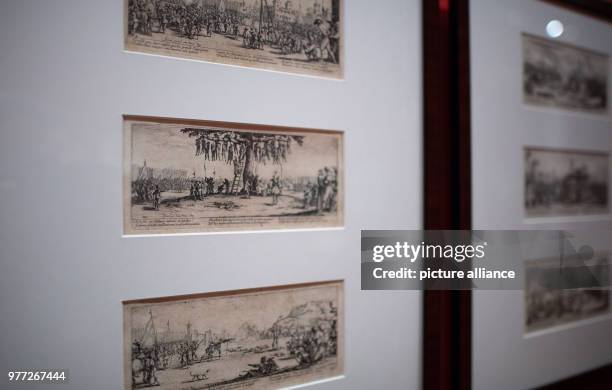 April 2018, Münster, Germany: Three etchings hang in the Town Museum, showing penalties for imprisoned marauders in the form of a jib , hanging and...