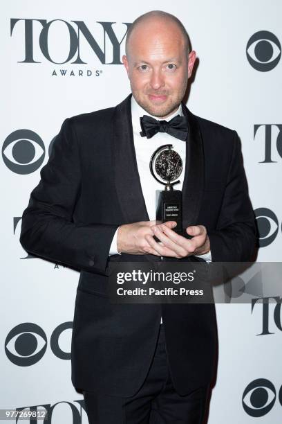 Award winner John Tiffany poses in the 72nd Annual Tony Awards Media Room at 3 West Club.