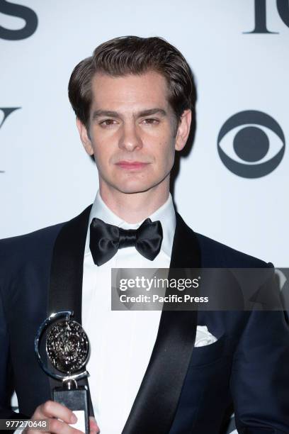Award winner Andrew Garfield poses in the 72nd Annual Tony Awards Media Room at 3 West Club.